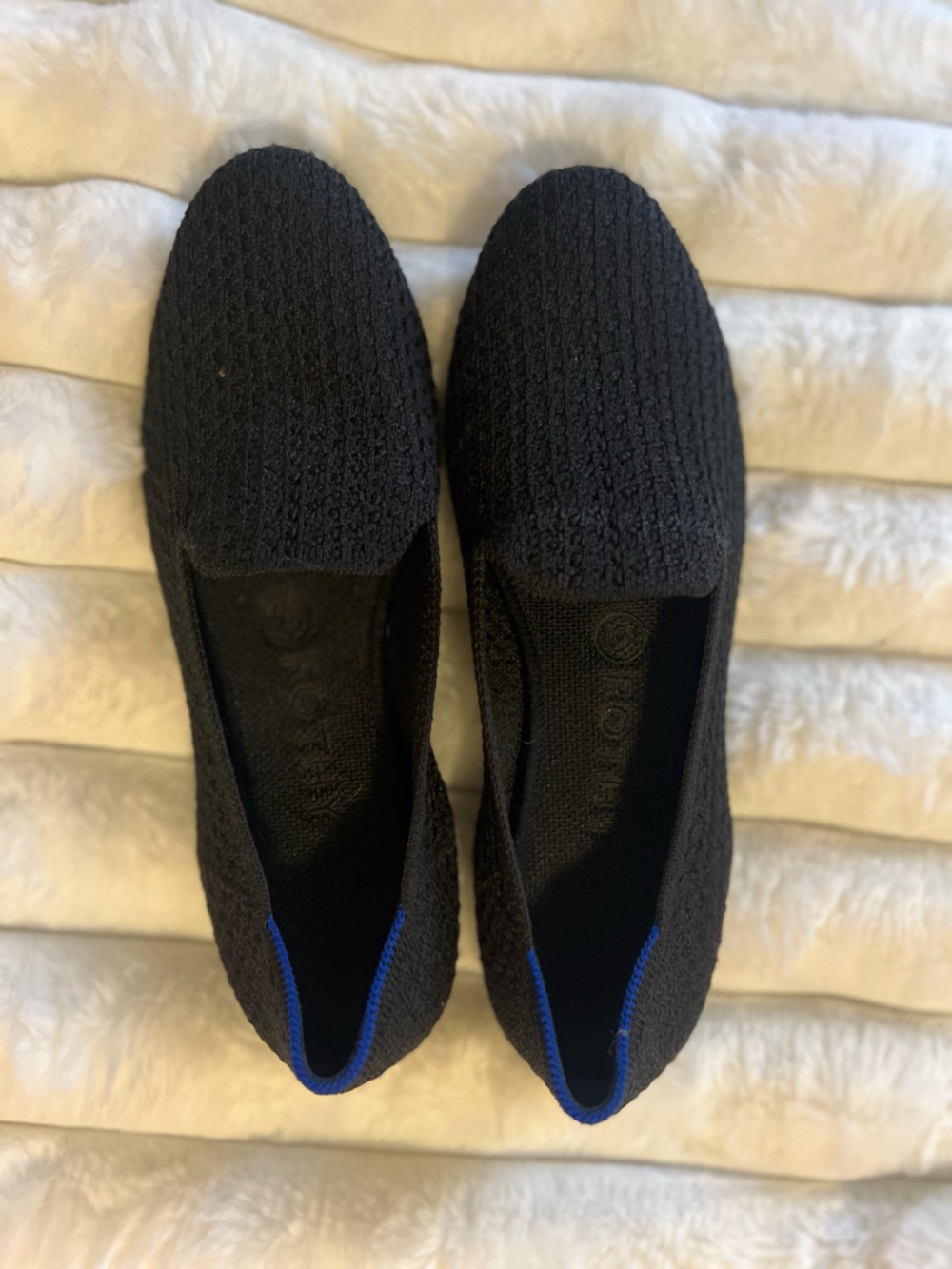 Rothy's Black Honeycomb Knit Slip-Ons with Blue Accent